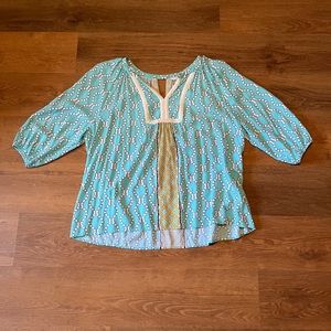 White and Blue colored blouse.